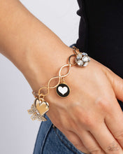 Load image into Gallery viewer, Paparazzi Accessories - Lullaby Lucky - Gold
