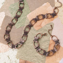 Load image into Gallery viewer, Paparazzi Accessories - Complete Look - Fluttering Form - Copper
