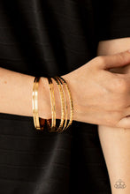 Load image into Gallery viewer, Paparazzi - How Do You Stack Up? - Gold
