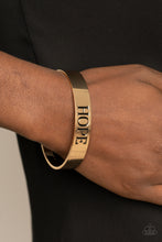 Load image into Gallery viewer, Paparazzi Accessories - Hope Makes The World Go Round - Gold
